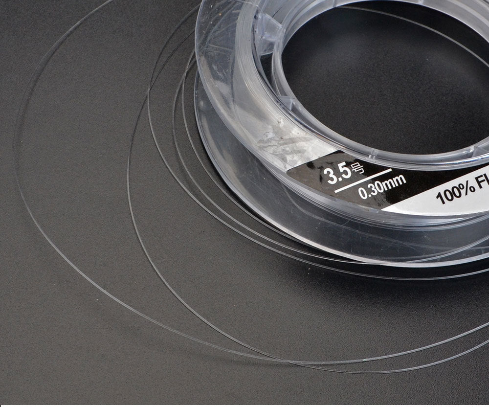Fil de pêche FTK 100 % fluorocarbone résistant à l'abrasion (100 mètres)